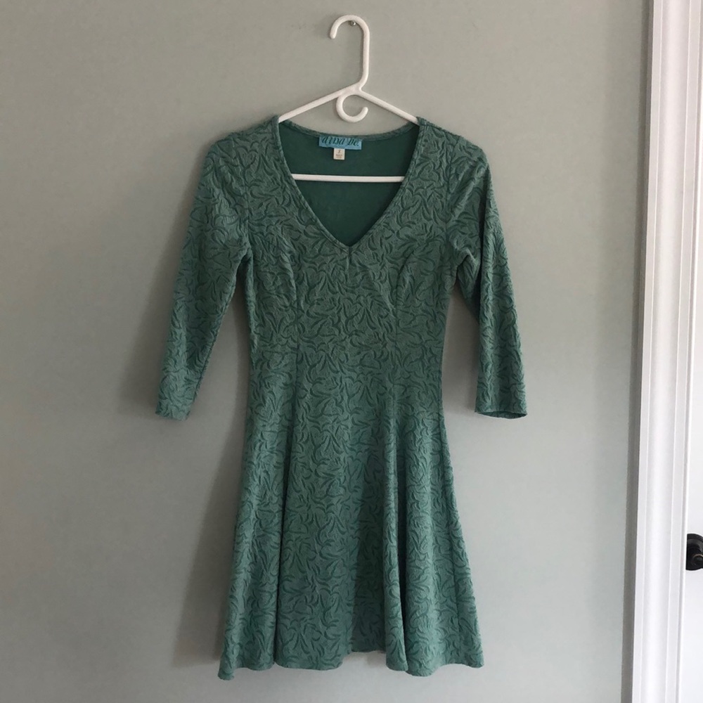 Mint green dress, figure hugging